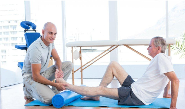 A patient doing physical therapy exercises in Forest Hills clinic