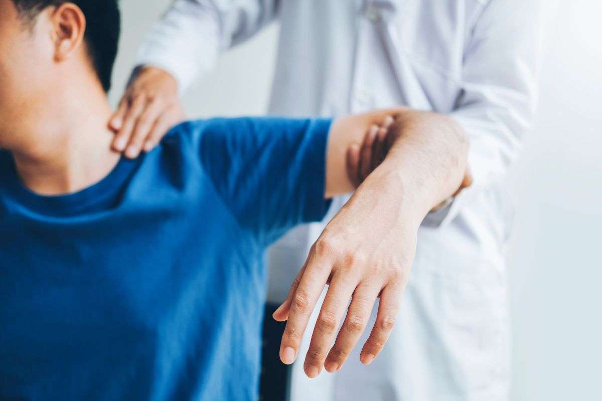 Patient receiving acupuncture and physical therapy treatment for back pain and low back pain in Great Neck NY wellness clinic